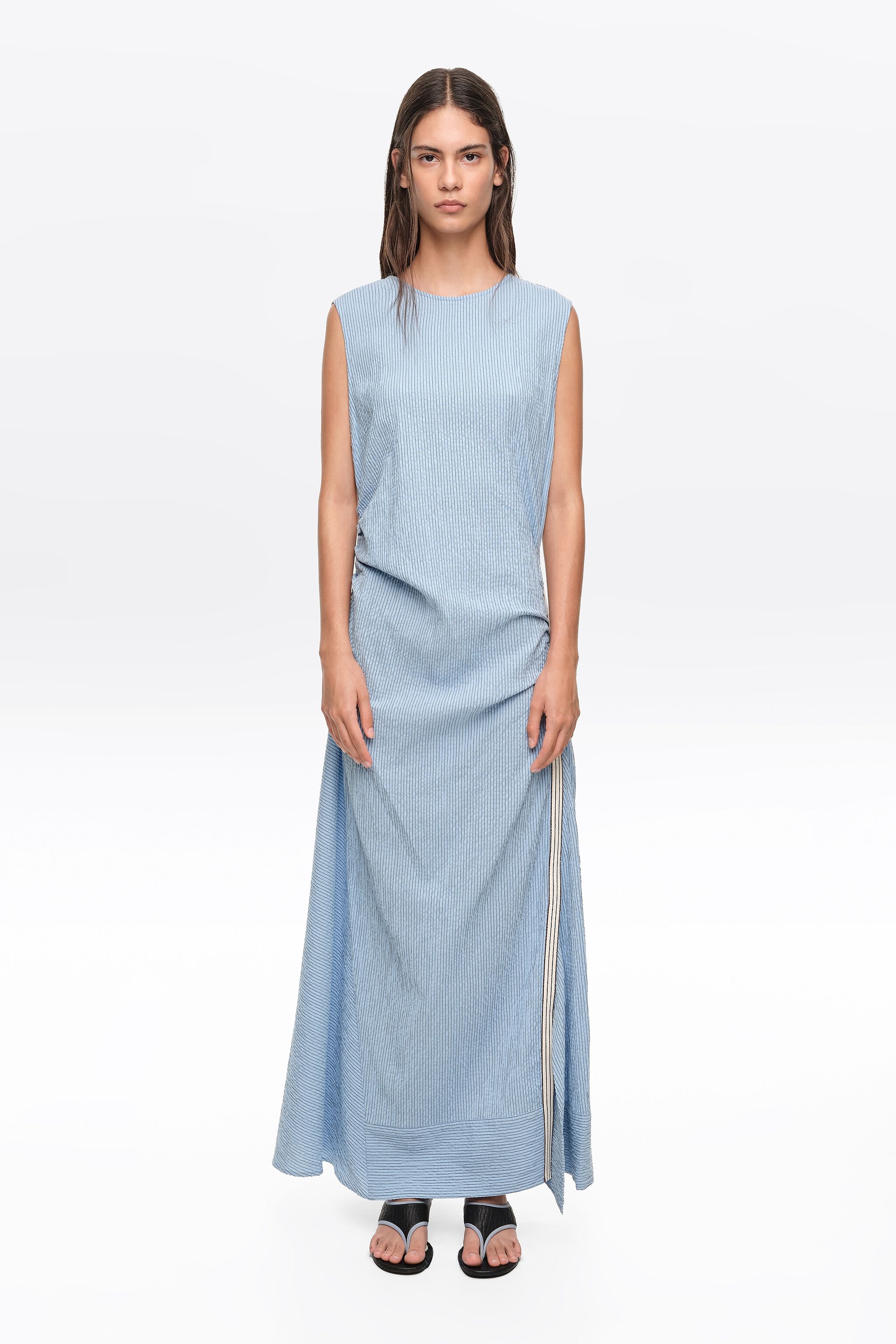 Sleeveless dress with blue striped overlay strap