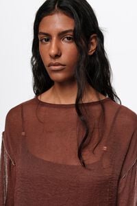 White boxy sweater with metallic beads