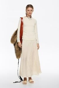 Vanilla pleated A-line midi skirt