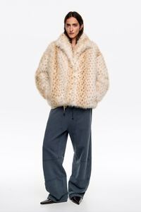 Short off-white fur coat