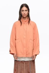 Short, orange fluid high neck trench