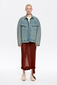 Світло-блакитна джинсова куртка з камінням