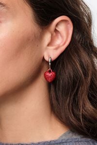Silver hoop earrings with red crystals heart