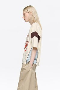 Ivory ballerinas logo raglan T-shirt