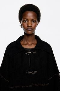 Black cardigan with metal hooks