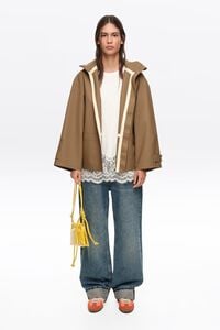 Dark camel rubberized A-line trench