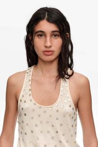 Beige top with mother-of-pearl pieces