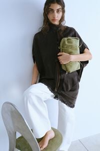 Washed black knotted neckline cape shirt