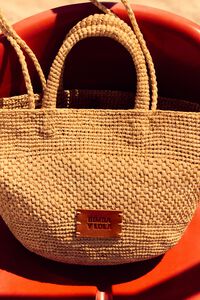 Large natural raffia plaited bag