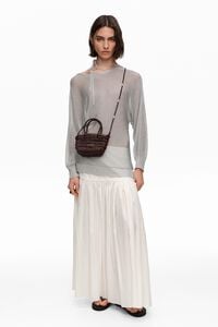 Bolso mini trenzado piel marr&oacute;n oscuro