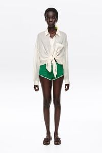 Green embroidered knit shorts