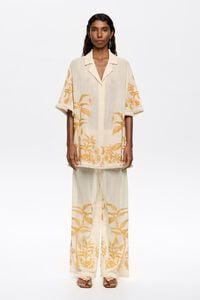 Pantalón recto bordados y desflecados vainilla