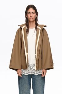 Dark camel rubberized A-line trench