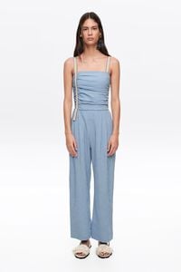Blue striped jumpsuit with gathered straps