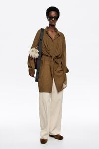 Ivory corduroy barrel leg trousers