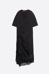 Vestido camiseta bimateria con nudo negro