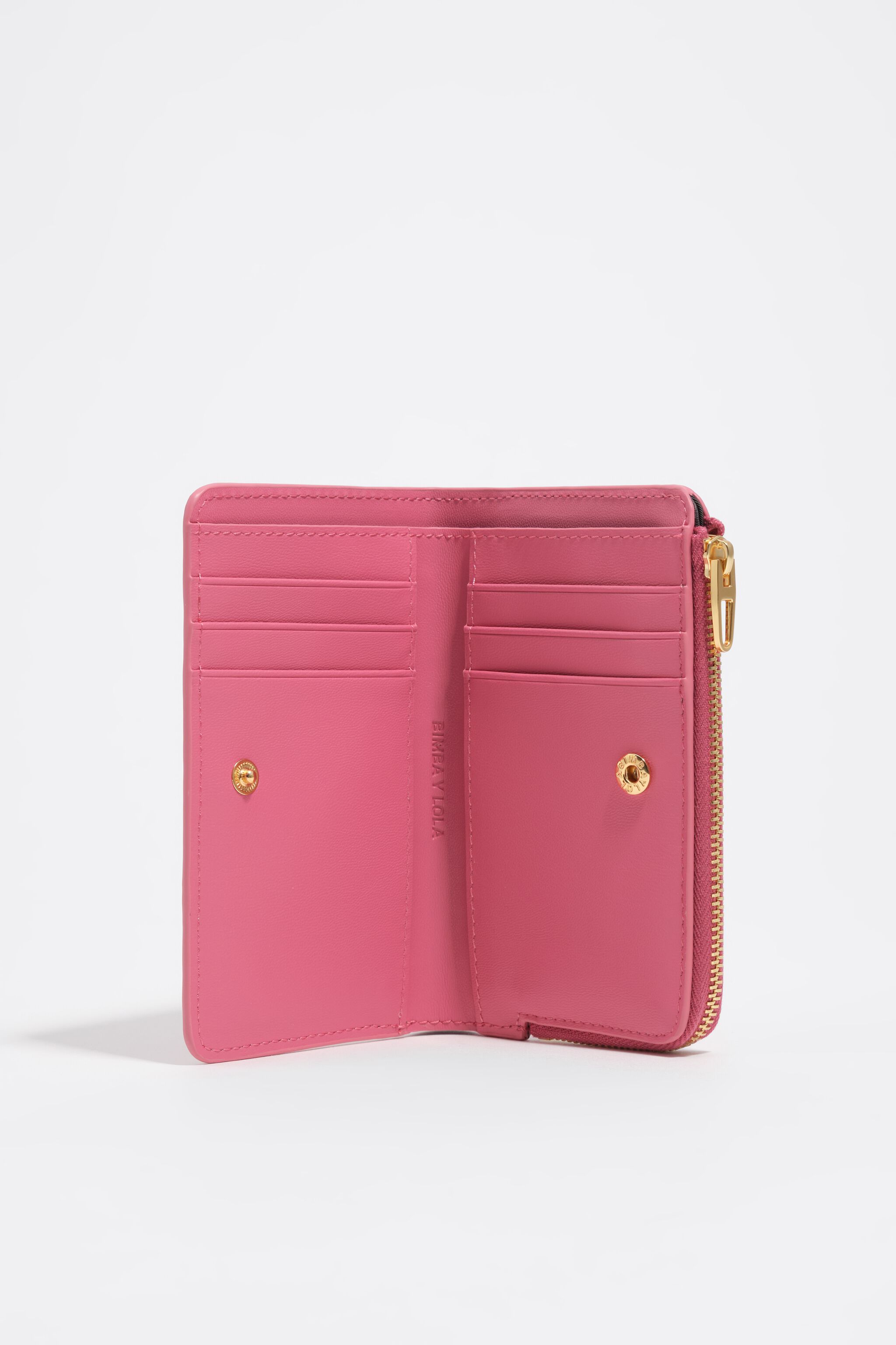 Dark pink embossed crocodile compact purse