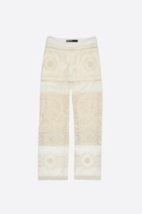 Ecru trousers with embroidery and openwork