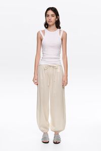 Pantal&oacute;n bombacho lunares metalizados beige