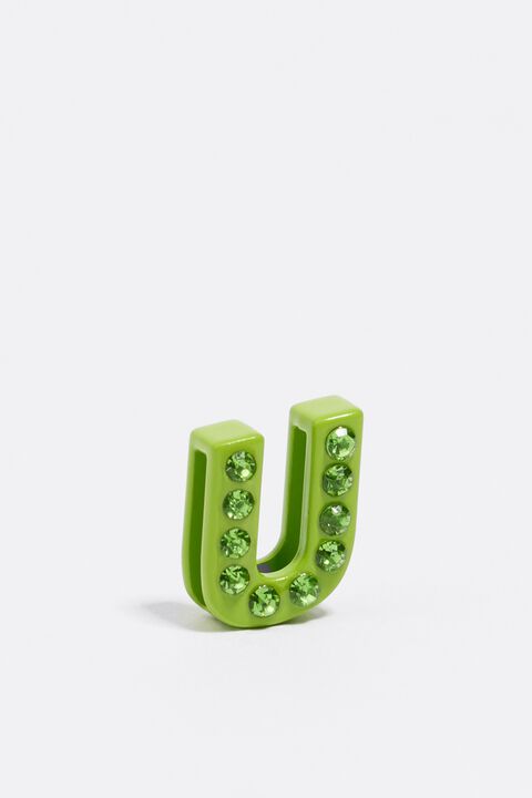 green metal letter b