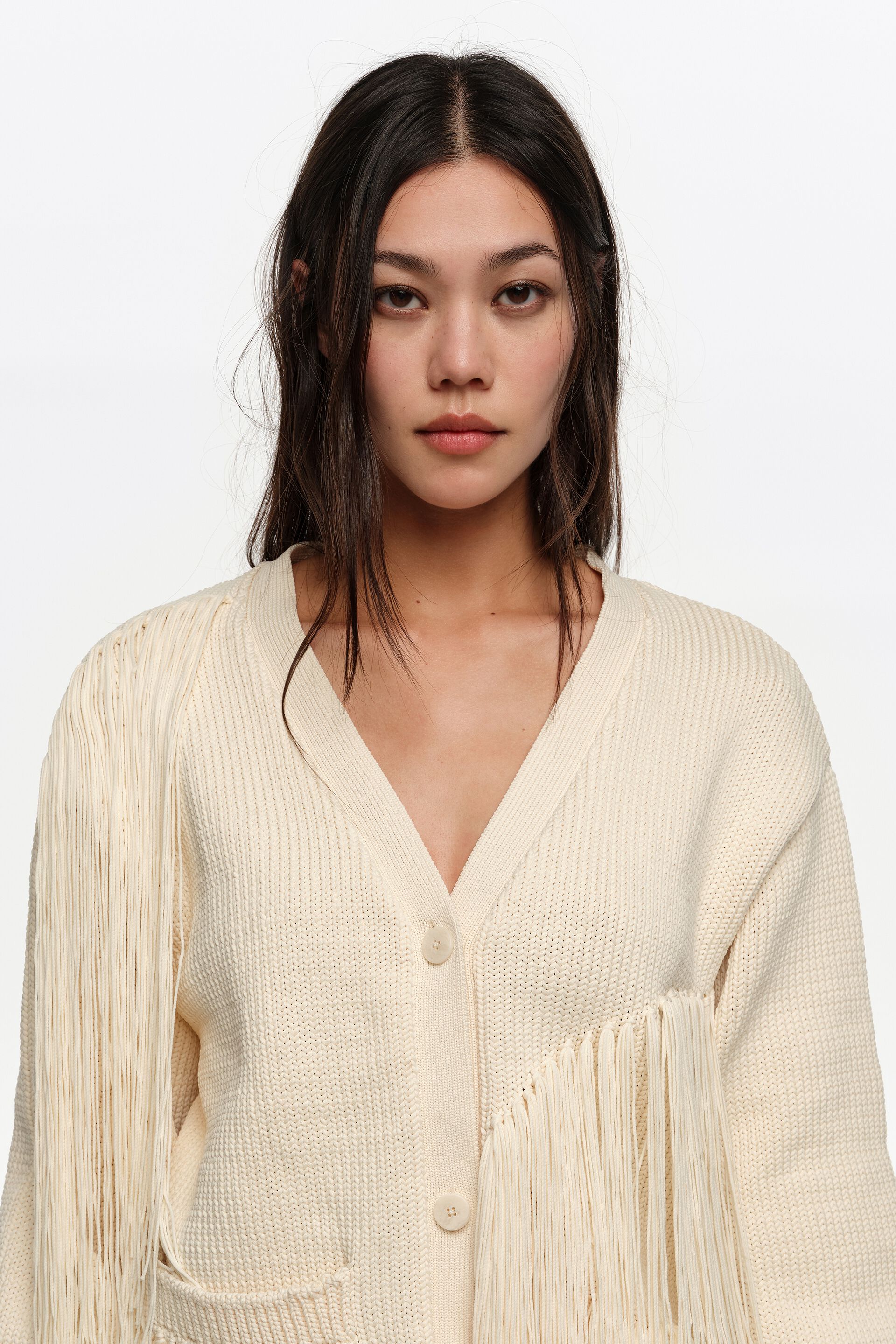 Ivory fringed knit cardigan