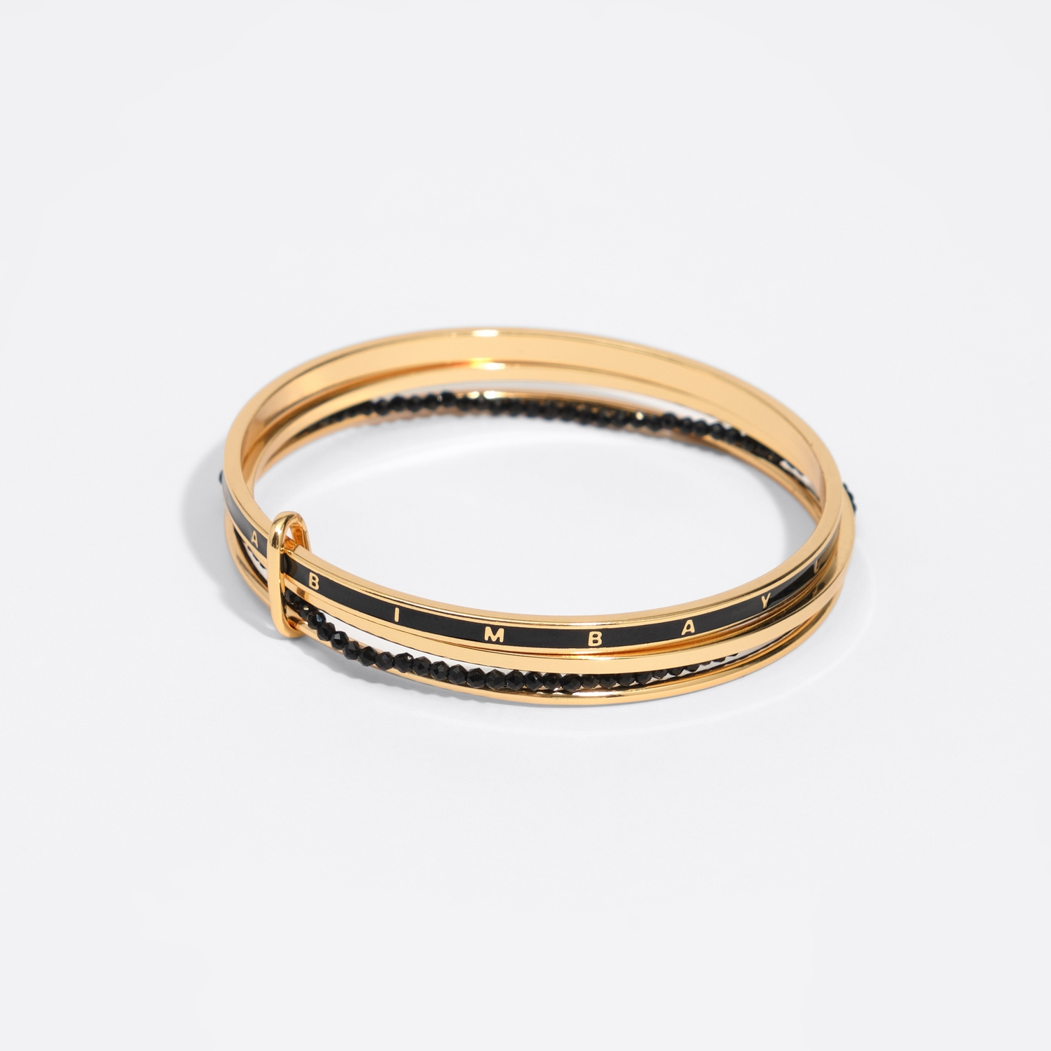 Image of Gold metal band bracelets with crystals and black logo